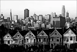  ?? ERIC RISBERG/AP ?? The Salesforce Tower, at right, rises in the downtown San Francisco skyline.