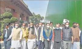  ?? ?? Congress leader Rahul Gandhi with other opposition members during a protest march from Gandhi statue in Parliament to Vijay Chowk on Tuesday.