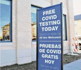  ?? Cassandra Day/Hearst Connecticu­t ?? A sign for the Community Health Center COVID-19 testing center on Grand Street in Middletown in 2020.