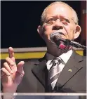  ?? CONTRIBUTE­D ?? Former PM Bruce Golding addresses the town hall meeting.