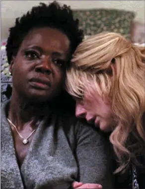  ?? Viola Davis as Veronica Rawlins and Elizabeth Debicki as Alice Gunner in Widows. ??