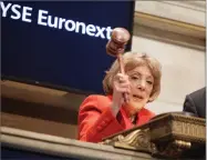  ?? AP FILE PHOTO BY SETH WENIG ?? In this 2009 photo, Evelyn Y. Davis uses a gavel to ring the closing bell at the New York Stock Exchange in New York.