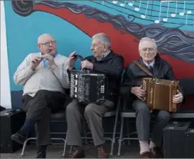  ??  ?? Some of the local musicians performing at the unveiling.