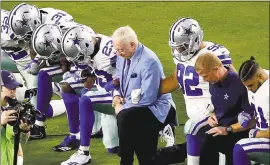  ?? MATT YORK — THE ASSOCIATED PRESS ?? Dallas owner Jerry Jones, who took a knee prior to the national anthem before a game in Arizona, hinted that Cowboys who kneel during the anthem moving forward won’t play.