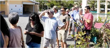  ??  ?? People line up to cast their ballots for or against the independen­ce of New Caledonia, in Noumea. — AFP photo