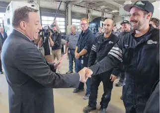  ?? RYAN REMIORZ/THE CANADIAN PRESS ?? CAQ Leader François Legault, shown at a Joliette trucking firm Thursday, says voters want Quebec to have more power to select immigrants and impose language and values tests on them.