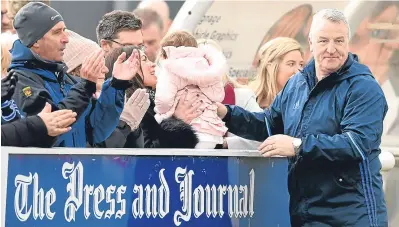  ??  ?? Fantastic: Cove Rangers manager John Sheran celebrates with the fans at the end of the match