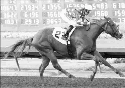  ?? BENOIT & ASSOCIATES ?? Intimidate notches his first stakes victory with a win in the King Glorious on Saturday at Los Alamitos.