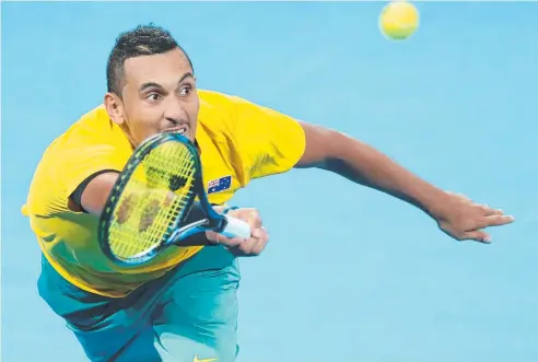  ??  ?? LOW-FUSS WIN: Nick Kyrgios of Australia on his way to victory against John Isner of the US. Picture: DARREN ENGLAND.