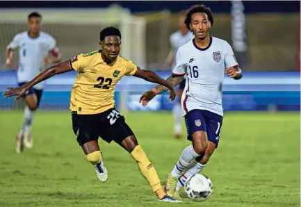  ?? FERNANDO LLANO/AP ?? United States’ Gianluca Busio, right, controls the ball against Jamaica’s Devon Williams on Tuesday. The Americans have six more World Cup qualifiers on the schedule – three at home and three on the road.