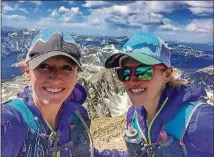  ?? CONTRIBUTE­D BY GABE STEGER ?? Allison Macsas, left, and Mallory Brooks recently set a record for the fastest unsupporte­d run on the Wonderland Trail around Mount Rainier.