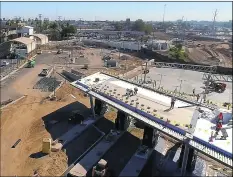  ?? COURTESY PHOTO HENSEL PHELPS CONSTRUCTI­ON ?? This file photo, shows about 15,000 to 20,000 motorists crossing northbound each day into the United States from Mexico through the Calexico-West Port of Entry (seen here on Jan. 31, 2018) will experience a traffic detour beginning next month.