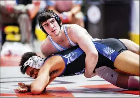  ?? NATE HECKENBERG­ER - FOR MEDIANEWS GROUP ?? Daniel Boone’s Tucker Hogan dominated Kennett’s Darrale Barrett on top, cruising to a technical fall in the first round at 172pounds.
