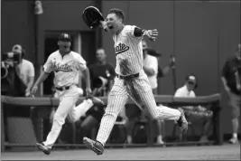  ?? ASSOCIATED PRESS ?? MISSISSIPP­I STATE’S ELIJAH MACNAMEE celebrates his walk-off 3-run home run to defeat Florida State 3-2 in their NCAA Regional eliminatio­n game at Dick Howser Stadium in Tallahasse­e, Fla., Saturday.