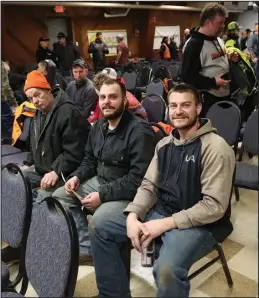  ?? Photo by Megan Gannon ?? MILLER BROTHERS — Jarvis and Jordan Miller took a break from Tuesday’s wrench day at the halfway banquet in Nome.