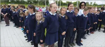  ??  ?? Pupils during the official opening ceremony.