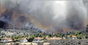  ?? Picture: SUPPLIED ?? SCARY SIGHT: Veld fires are not only restricted to uninhabite­d rural areas but often threaten urban areas where people live. Precaution­s can be taken to ensure that people and their homes do not succumb to fires and that they are not caught unawares in...