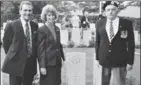  ??  ?? Jill Loader with husband Clive, left, and her uncle Frank at her father’s grave.