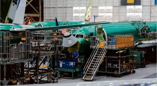  ?? RUTH FREMSON/NEW YORK TIMES ?? The assembly line at the Boeing plant in Renton, Wash. Federal officials are investigat­ing Boeing’s safety and production procedures.
