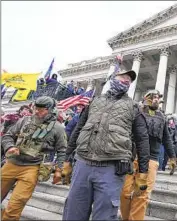 ?? Manuel Balce Ceneta Associated Press ?? MEMBERS of the Oath Keepers, whose leaders are charged with seditious conspiracy, on Jan. 6, 2021.