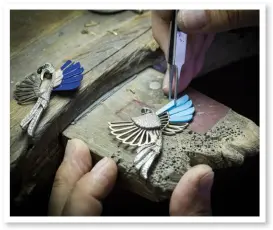  ??  ?? Jewelled DELICACY A craftsman works on a brooch from Van Cleef & Arpels’ L’arche de Noe collection