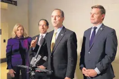  ?? PATRICK SEMANSKY/ASSOCIATED PRESS ?? Rep. Adam Schiff, D-Calif., center, speaks with members of the media about the impeachmen­t inquiry as Carolyn Maloney, D-N.Y., from left, Rep. Jamie Raskin, D-Md., and Rep. Eric Swalwell, D-Calif. look on.