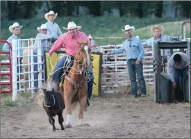  ?? Tim Conover ?? Local cowboy Matthew Miller of Callaway, pictured above, competed in Tie Down Roping Friday night in Callaway. He had a time of 10.1 seconds which placed him third overall earning him a check for $464.04.