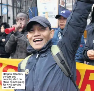  ??  ?? Hospital cleaners, porters and catering staff on strike campaignin­g for NHS pay and conditions