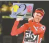  ?? AFP-Yonhap ?? Team Sky’s British cyclist Chris Froome celebrates on the podium winning the 72nd edition of “La Vuelta” Tour of Spain cycling race, in Madrid, Sunday.