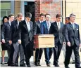  ??  ?? The funeral procession for Otto Warmbier, who died after he was returned to the US