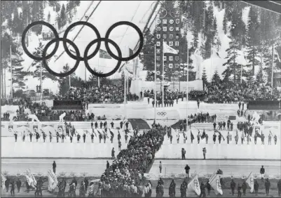  ?? Olympic Valley. (File Photo/ap) ?? Olympic athletes march into Blyth Arena on Feb. 28, 1960, at Squaw Valley for the ceremony to end the Winter Olympic Games in