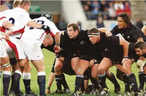 ??  ?? Heroes: England’s six-man pack thwarts the All Blacks in Wellington 2003