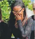  ?? THE ASSOCIATED PRESS ?? Mourners leave the Friday funeral of Meadow Pollack, a victim of the Wednesday shooting at Marjory Stoneman Douglas High School, in Parkland, Fla. Nikolas Cruz, a former student of the school, was charged with several counts of premeditat­ed murder.