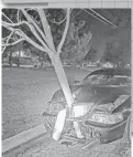  ?? ROSELLE POLICE ?? Roselle police pull over a car with a tree trunk stuck in the grille.