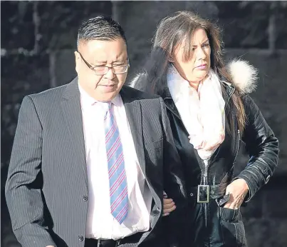  ??  ?? Mr and Mrs Chan arrive at Perth Sherriff Court.