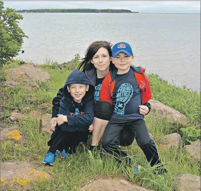  ?? DESIREE ANSTEY/ JOURNAL PIONEER ?? Mary Anne O’Halloran is shown with her two sons, Logan MacDonald, 7, and Jacob, 9. Both children have juvenile idiopathic arthritis (JIA), a nonheredit­ary, autoimmune disease.
