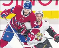  ?? CP PHOTO ?? Montreal Canadiens’ Jonathan Drouin battles Ottawa Senators’ Gabriel Dumont during NHL action Wednesday, Nov. 29, 2017, in Montreal.