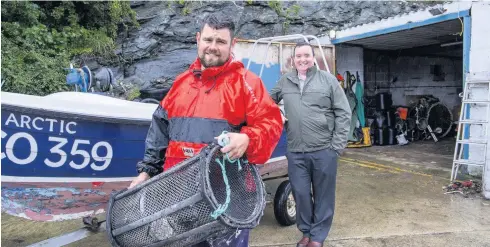  ??  ?? Royal Navy veteran Sion Riley launched Holyhead Shellfish in July. Pictured with Siôn Wynne, investment executive at the Developmen­t Bank of Wales