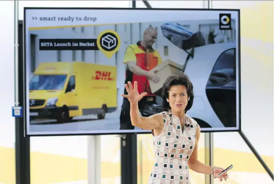  ?? PHOTOS: KRISZTIAN BOCSI/BLOOMBERG ?? Annette Winkler of Daimler AG’s Smart brand says the plan to link with Deutsche Post AG’s DHL package operation is “designed to ease urban life.”