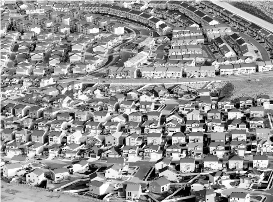  ?? AP ?? This April 13, 2019 photo shows an aerial view of houses in suburban Salt Lake City, United States.