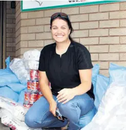  ?? ?? Caroline Pitout of Judea Harvest is ecstatic with their portion to distribute