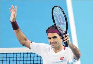  ?? PHOTO: REUTERS ?? Mr Tennis . . . Tennis great Roger Federer, of Switzerlan­d, celebrates after beating American Tennys Sandgren 63, 26, 26, 76 in their fourthroun­d clash at the Australian in Open in Melbourne last night.