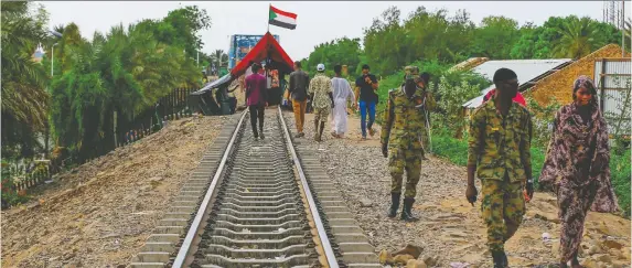  ?? ASHRAF SHAZLY/GETTY IMAGES ?? The Sudanese Railway Corp. has some of the most extensive rail networks in Africa, but the system, which represents a lifeline for the country, has fallen into decrepitud­e after years of government corruption during the dictatorsh­ip of Omar al-Bashir. There is a US$640-million plan to resurrect the railroad network.