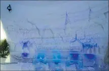  ??  ?? In the domed
lobby of the Snow Village’s
ice hotel, a New York panorama
emerges from the hard, white, frozen walls. Doré and fellow sculptors Jean François Gauthier and Daniel Gaudreault have carved a frieze of Central Park, complete with trees and...