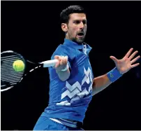  ?? — Reuters ?? DOMINANT: Novak Djokovic plays a shot against Diego Schwartzma­n.