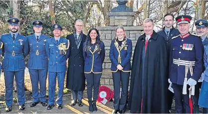  ?? ?? Ceremony Krisha Modi and Jess Thomsen, beneficiar­ies of a programme honouring the memory of Pilot Officer Carlyle Everiss