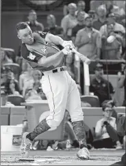  ?? WILFREDO LEE/AP PHOTO ?? The Yankees’ Aaron Judge swings during Monday’s AllStar Home Run Derby in Miami. The rookie hit 47 home runs over three rounds, including one that traveled 513 feet, to win the event.