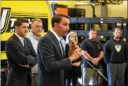  ?? PETE BANNAN — DIGITAL FIRST MEDIA ?? U.S. Rep. Ryan Costello, R-6, speaks at J-Tech Inc. Thursday. With him is House Speaker Paul Ryan and business owner Scott Johnson.