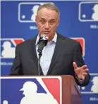  ?? BEN MARGOT/AP ?? Baseball Commission­er Rob Manfred is trying to make games go by faster.