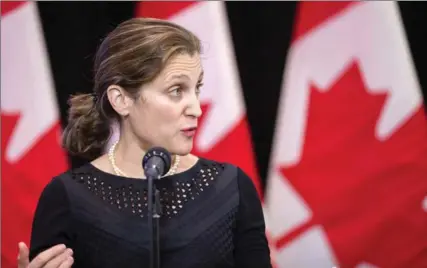  ?? GEOFF ROBINS, THE CANADIAN PRESS ?? Foreign Affairs Minister Chrystia Freeland speaks to the media as she arrives for the first day of a cabinet retreat in London, Ont., Thursday.